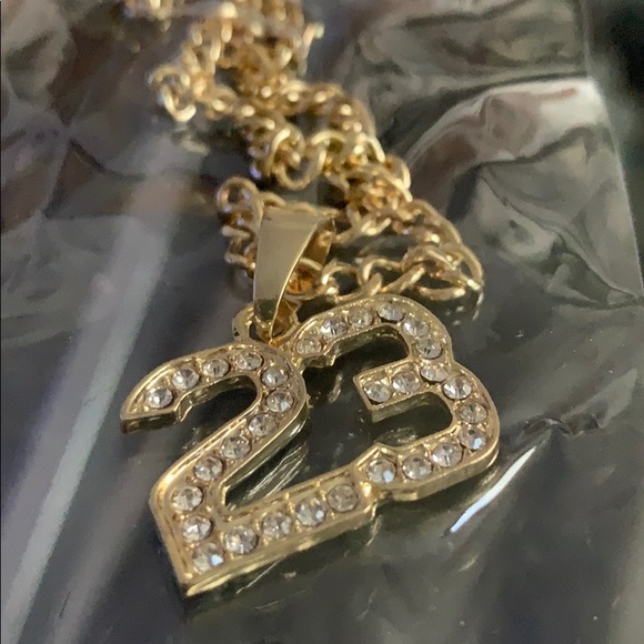 LeBron James is gifted a dazzling gold, diamond-encrusted chain